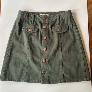 Cute green skirt with copper buttons